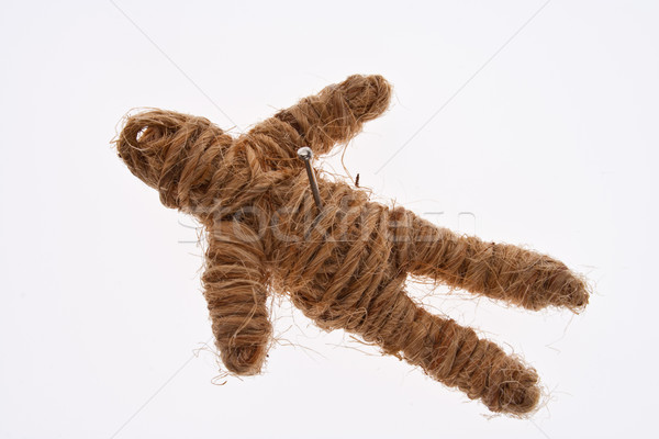 Rope Voodoo Doll with Nail on Chest Stock photo © pinkblue