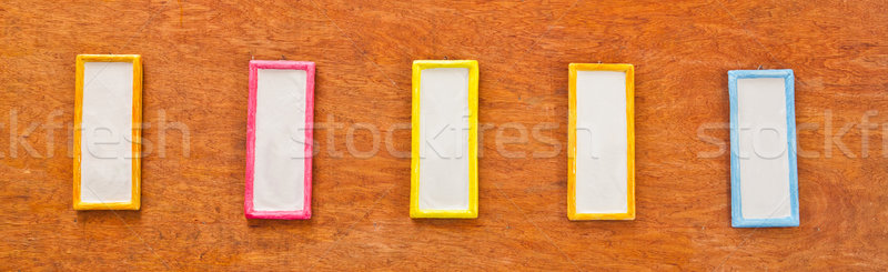 Colorful photo frame on wood wall Stock photo © pinkblue