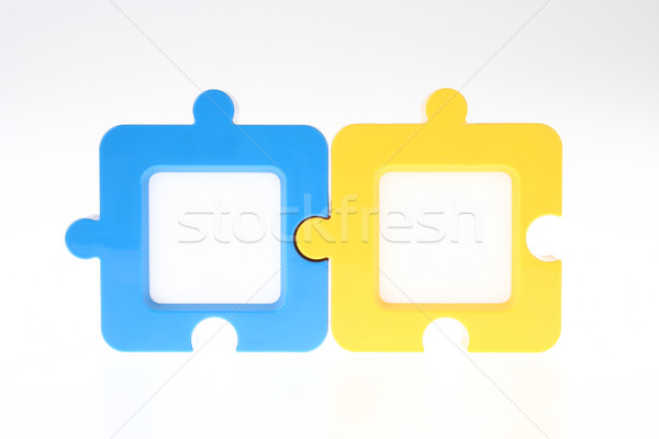 Couple of Jigsaw-Shape Photo Frame in Blue and Yellow Stock photo © pinkblue