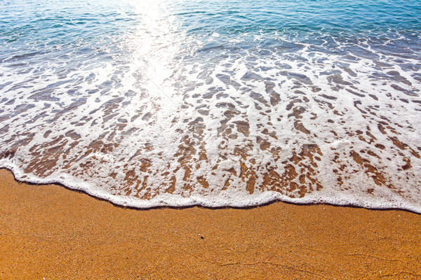 Puha hullám tenger homokos tengerpart nap fény Stock fotó © pixachi