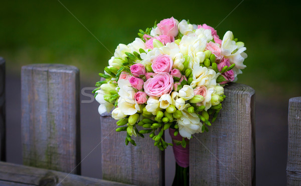 Wedding bouquet on rustic country fence  Stock photo © pixachi