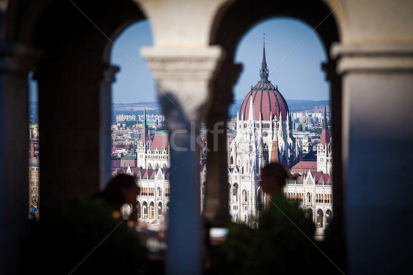 View of Hungarian Parliament Building with customers at Buda Cas Stock photo © pixachi