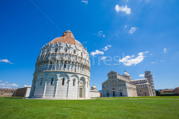 Pisa, Piazza del Duomo with Battistero, Basilica and the leaning Stock photo © pixachi