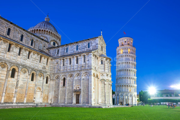 Piazza del Duomo with Pisa tower and the Cathedral illuminated a Stock photo © pixachi