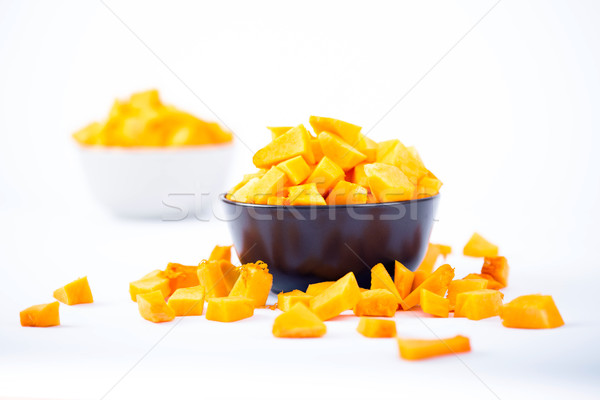 Pumpkin chunks on a bowl isolated Stock photo © pixachi