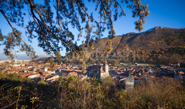 View of medieval Brasov city with Tampa Mountain on background o Stock photo © pixachi