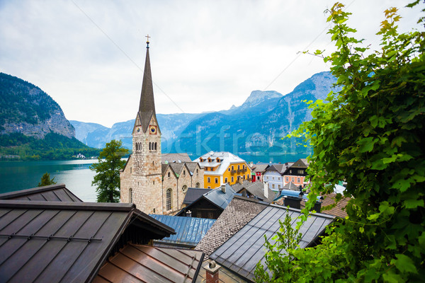 View of Hallstatt village with Christuskirche church bell tower Stock photo © pixachi