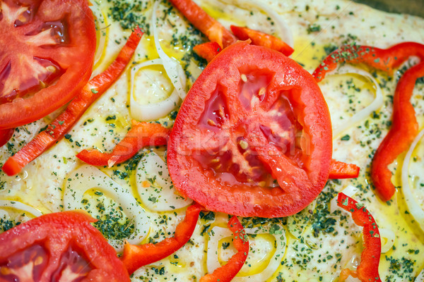 Tomato slice detail of traditional Italian focaccia bread Stock photo © pixachi