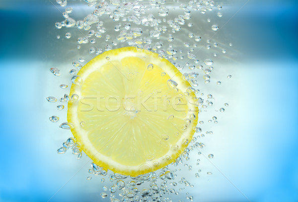 Zitronenscheibe Wasser Luft Blasen blau Natur Stock foto © pixelman