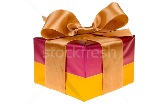 Presents with gold ribbon isolated on white background Stock photo © pixelman