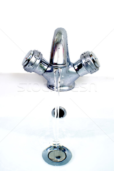 Stock photo: Tap and wash-basin
