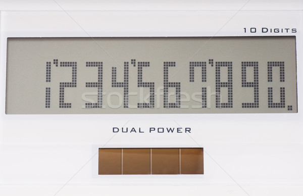 Display of white calculator, powered solar panel Stock photo © pixelman