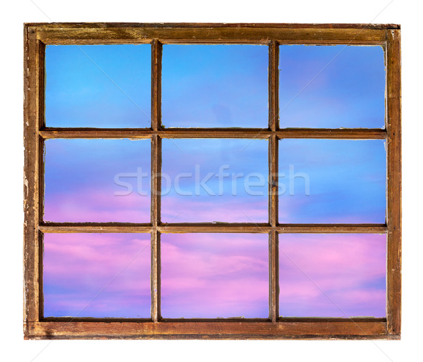 sunset sky as seen through old window Stock photo © PixelsAway