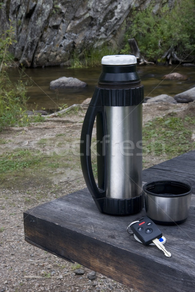 stop and rest when driving - car key, thermos bottle on picnic t Stock photo © PixelsAway