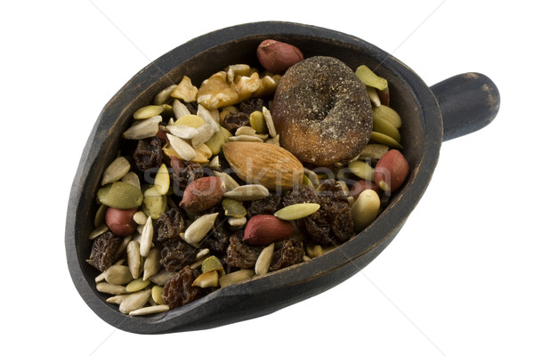 scoop of trail mix with nuts, seeds and fruits Stock photo © PixelsAway