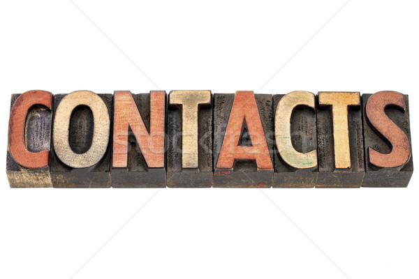 contacts word in wood type Stock photo © PixelsAway