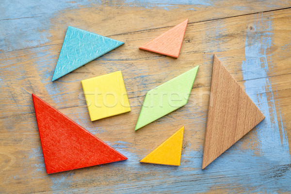 pieces of wooden tangram puzzle Stock photo © PixelsAway