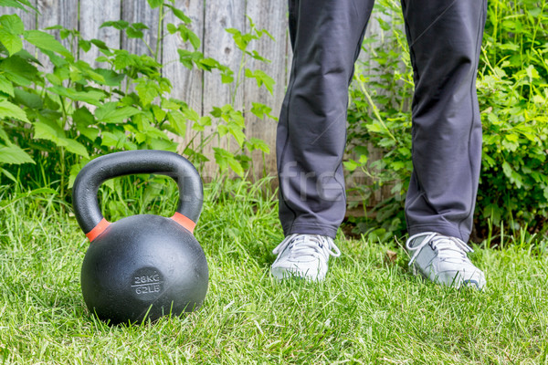 kettlebell workout in backyard Stock photo © PixelsAway