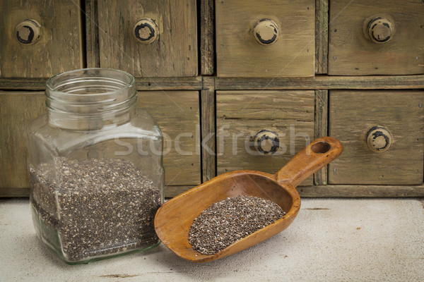 jar and scoop of chia seeds Stock photo © PixelsAway