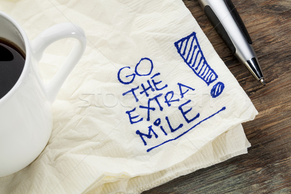 Extra motivacional eslogan servilleta taza café Foto stock © PixelsAway