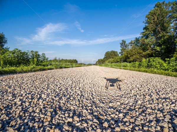 shadow of quadcopter drone flying Stock photo © PixelsAway