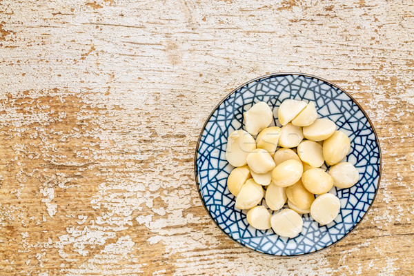 macadamia nuts on ceramic bowl Stock photo © PixelsAway