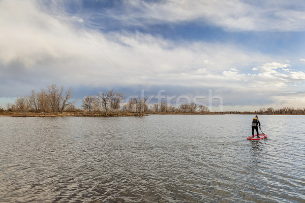 stand up paddling in fall Stock photo © PixelsAway