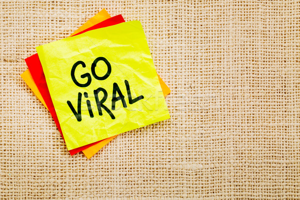 Go viral - sticky note Stock photo © PixelsAway