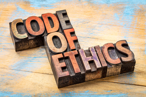 code of ethics bannert in wood type Stock photo © PixelsAway