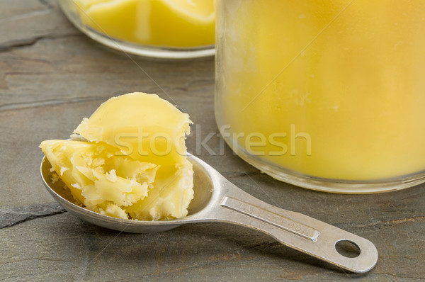 ghee - clarified butter spoon Stock photo © PixelsAway