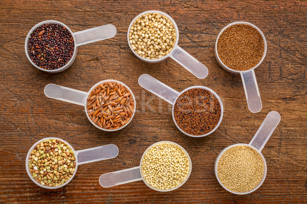 gluten free grains - measuring scoops on wood Stock photo © PixelsAway