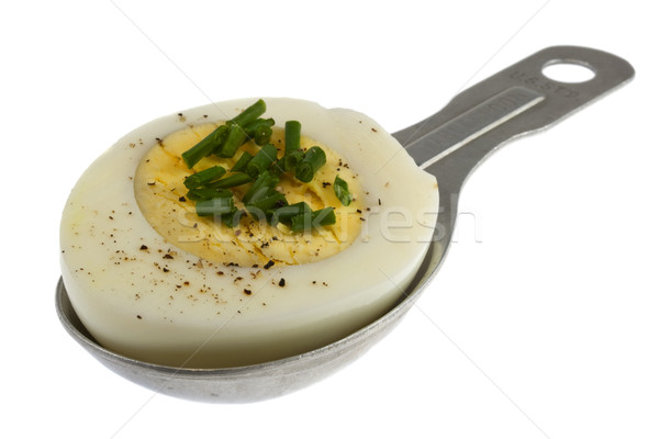 hard-boil egg with green chives on tablespoon Stock photo © PixelsAway