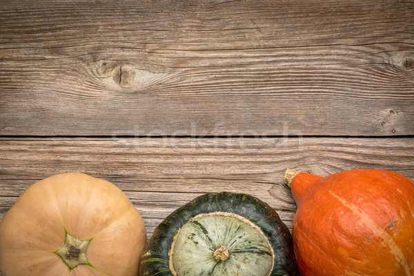 rustic wood background with winter squash Stock photo © PixelsAway