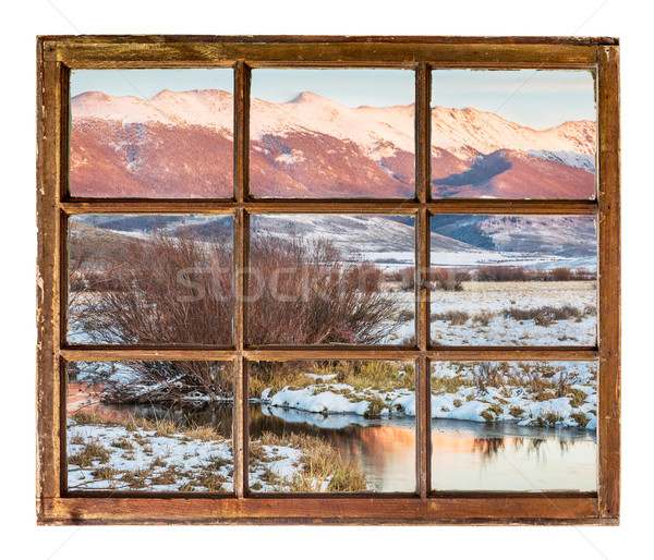 dusk over mountains window view Stock photo © PixelsAway