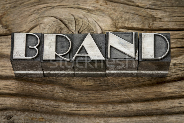 brand word in metal type Stock photo © PixelsAway