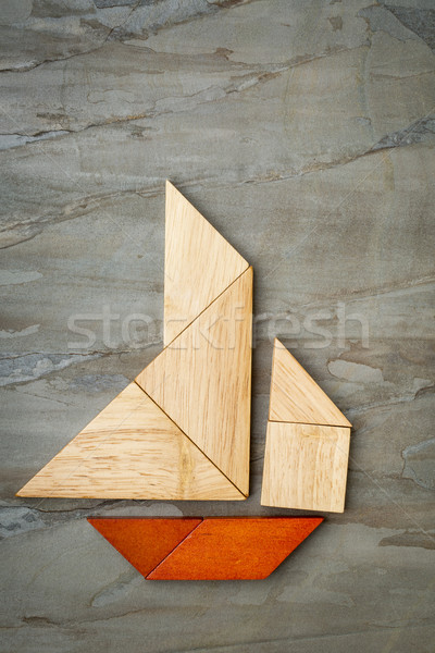 abstract sailboat from tangram puzzle Stock photo © PixelsAway