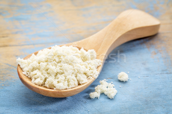 Stock photo: spoon of whey protein powder 