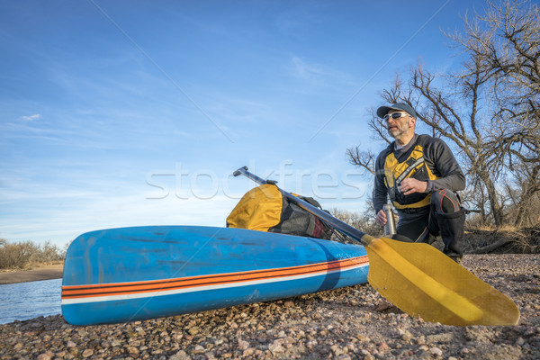 stand up paddling on a river Stock photo © PixelsAway