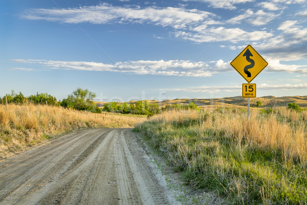 Stock photo: sandy ranch road descending into a valley of DIsmal RIver in Nebraska Sand Hills near Seneca, spring