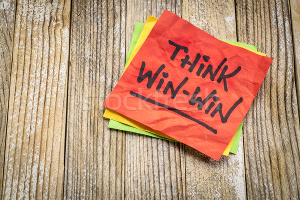 Think win-win reminder on sticky note Stock photo © PixelsAway