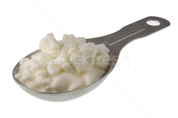 measuring tablespoon of cottage cheese Stock photo © PixelsAway