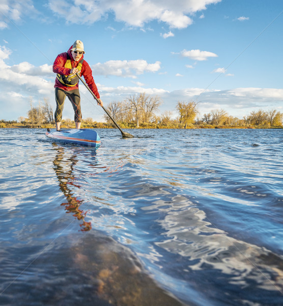 paddling stand up paddleboard  Stock photo © PixelsAway