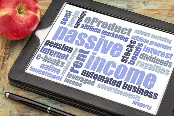Passive Einkommen Wort-Wolke Tablet digitalen roten Apfel Stock foto © PixelsAway