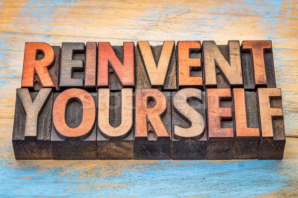 Stock photo: reinvent yourself - motivational words in vintage letterpress wo