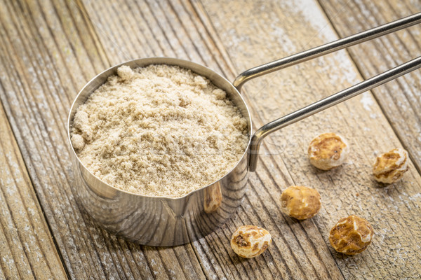 scoop of organic tiger nut powder Stock photo © PixelsAway