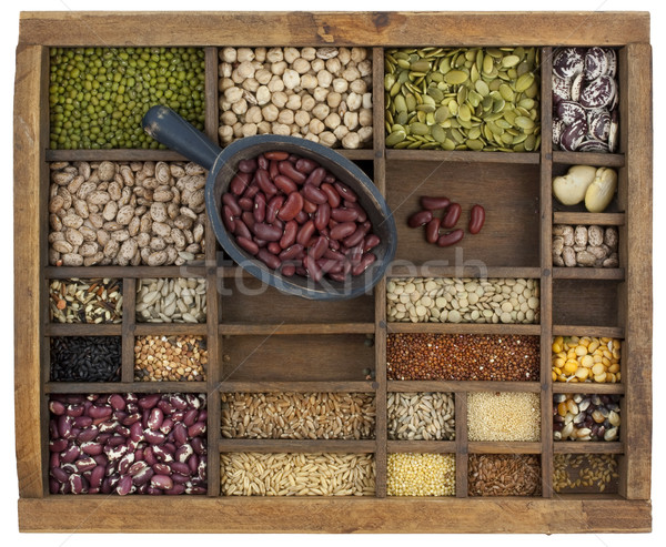 scoop of red kidney beans and a variety of grain and seeds Stock photo © PixelsAway