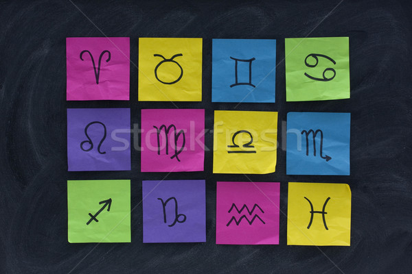 western zodiac symbols on sticky notes and blackboard Stock photo © PixelsAway