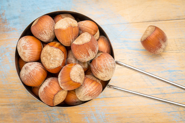 hazelnuts in metal measuring cup Stock photo © PixelsAway