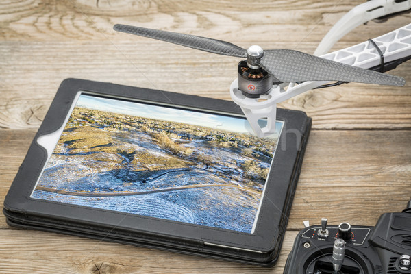 reviewing aerial picture on tablet Stock photo © PixelsAway
