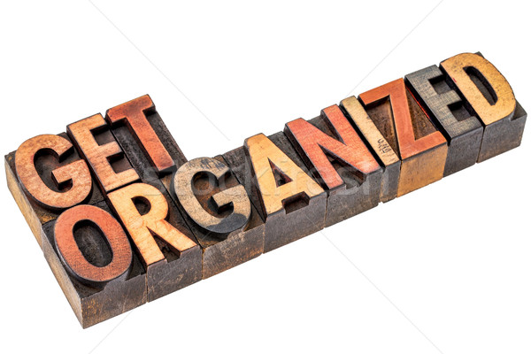 Stock photo: get organized in letterpress wood type